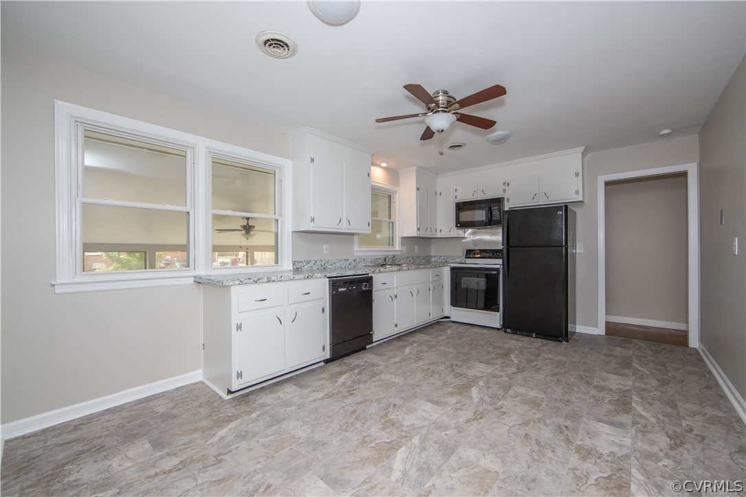 913 Yorkshire Road Colonial Heights, VA 23834 - Photo 7 of 26 Wow! The eat in, updated kitchen has new vinyl fl