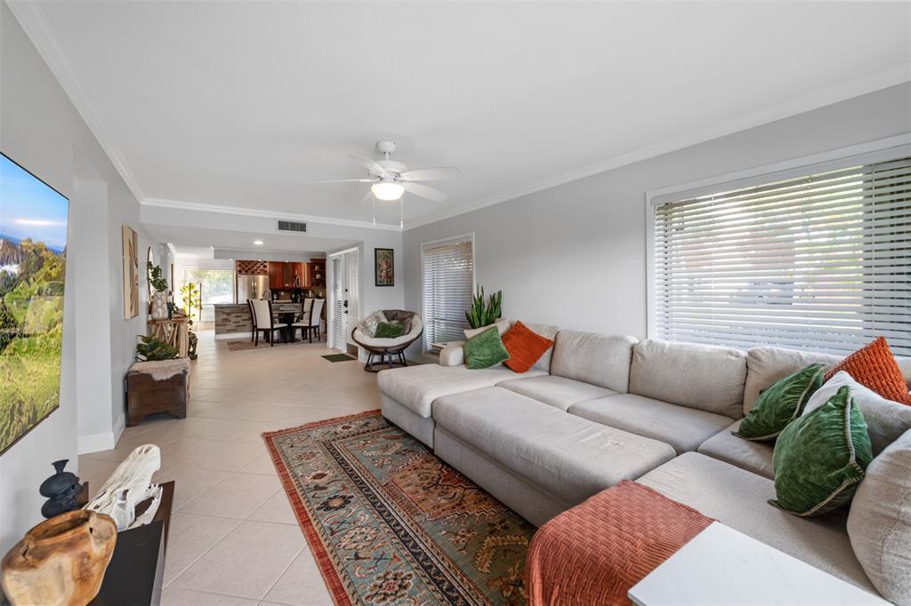 11927 Southwest 13th Court Davie, FL 33325 - Photo 14 of 41 a living room with furniture and a large window