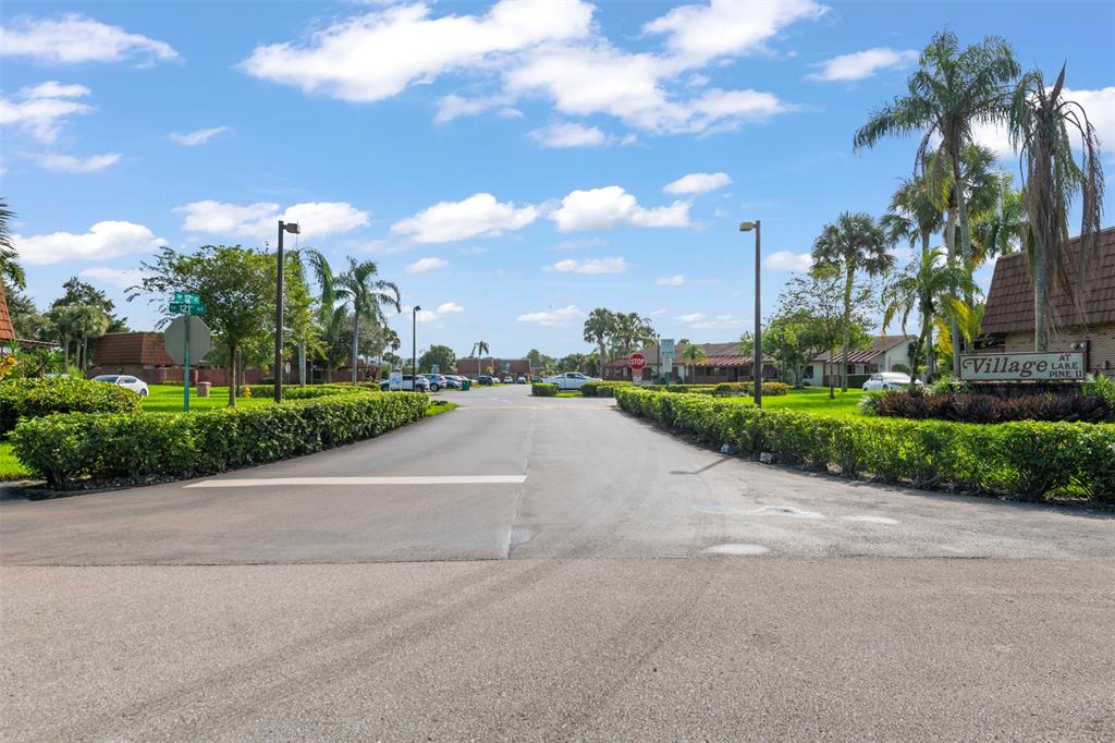 11927 Southwest 13th Court Davie, FL 33325 - Photo 2 of 41 a view of a street with a houses