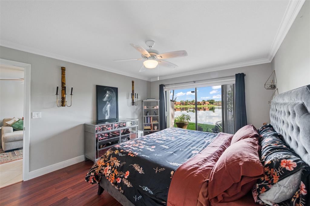 11927 Southwest 13th Court Davie, FL 33325 - Photo 24 of 41 a bed sitting in a bedroom next to a window