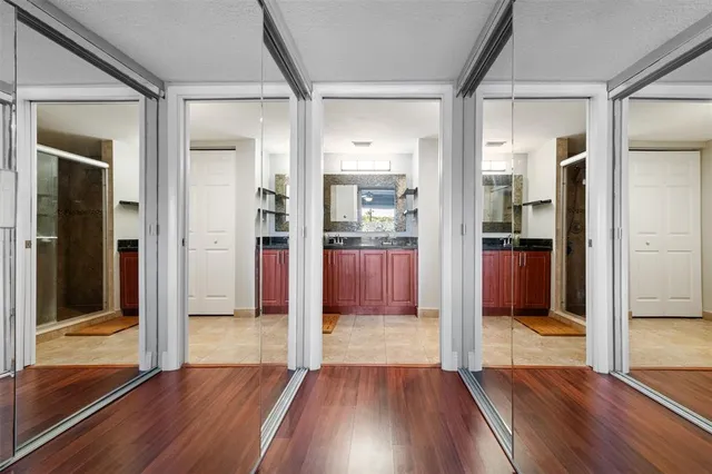 a view of a house with a yard and plants