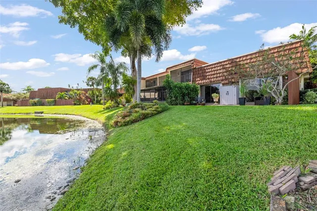 a view of a garden with a building