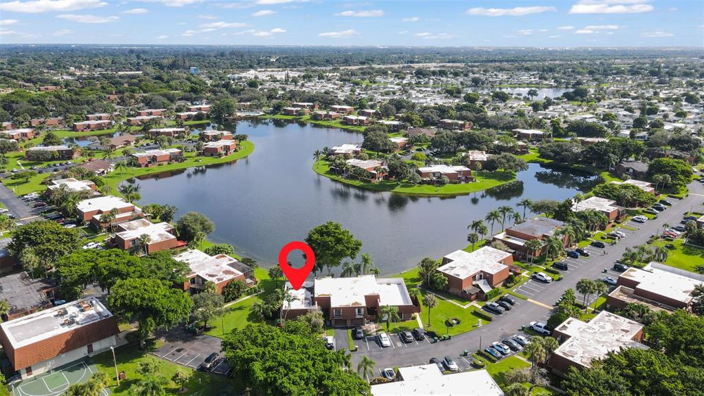 11927 Southwest 13th Court Davie, FL 33325 - Photo 33 of 41 an aerial view of lake houses residential house with outdoor space