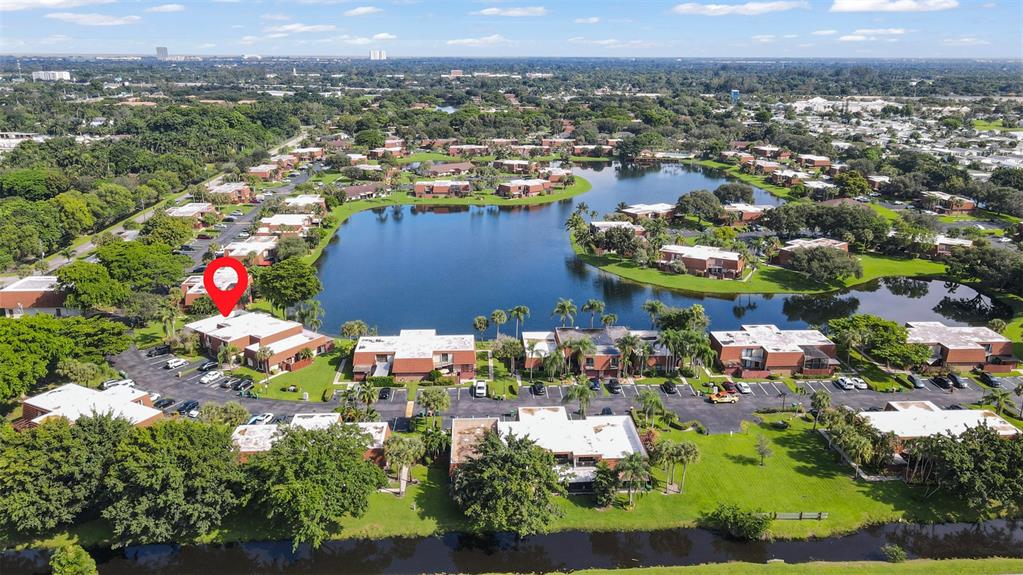 11927 Southwest 13th Court Davie, FL 33325 - Photo 34 of 41 an aerial view of a houses with a lake