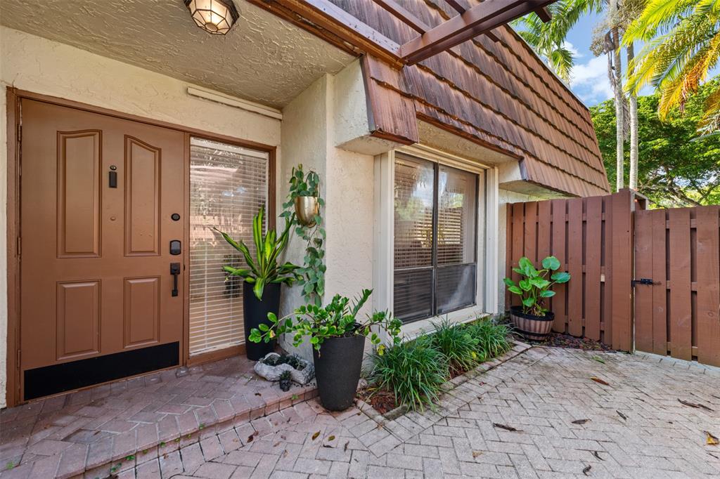 11927 Southwest 13th Court Davie, FL 33325 - Photo 9 of 41 a view of a entryway door front of house