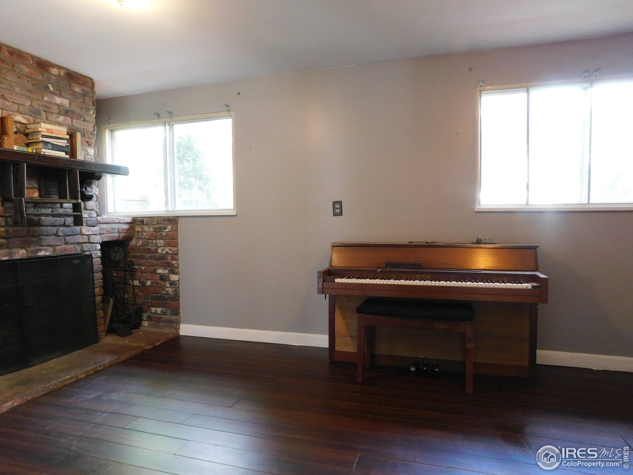 2800 Redwing Road Fort Collins, CO 80526 - Photo 12 of 15 garden level family room/fireplace