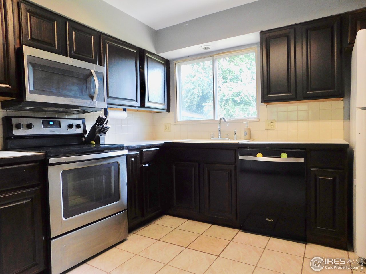 2800 Redwing Road Fort Collins, CO 80526 - Photo 4 of 15 main level kitchen