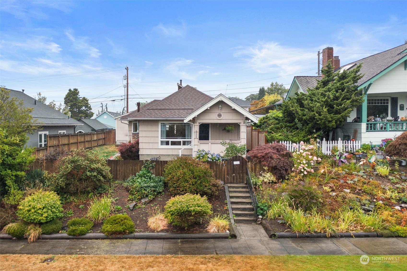 1524 Rockefeller Avenue Everett, WA 98201 - Photo 1 of 37 a front view of a house with garden