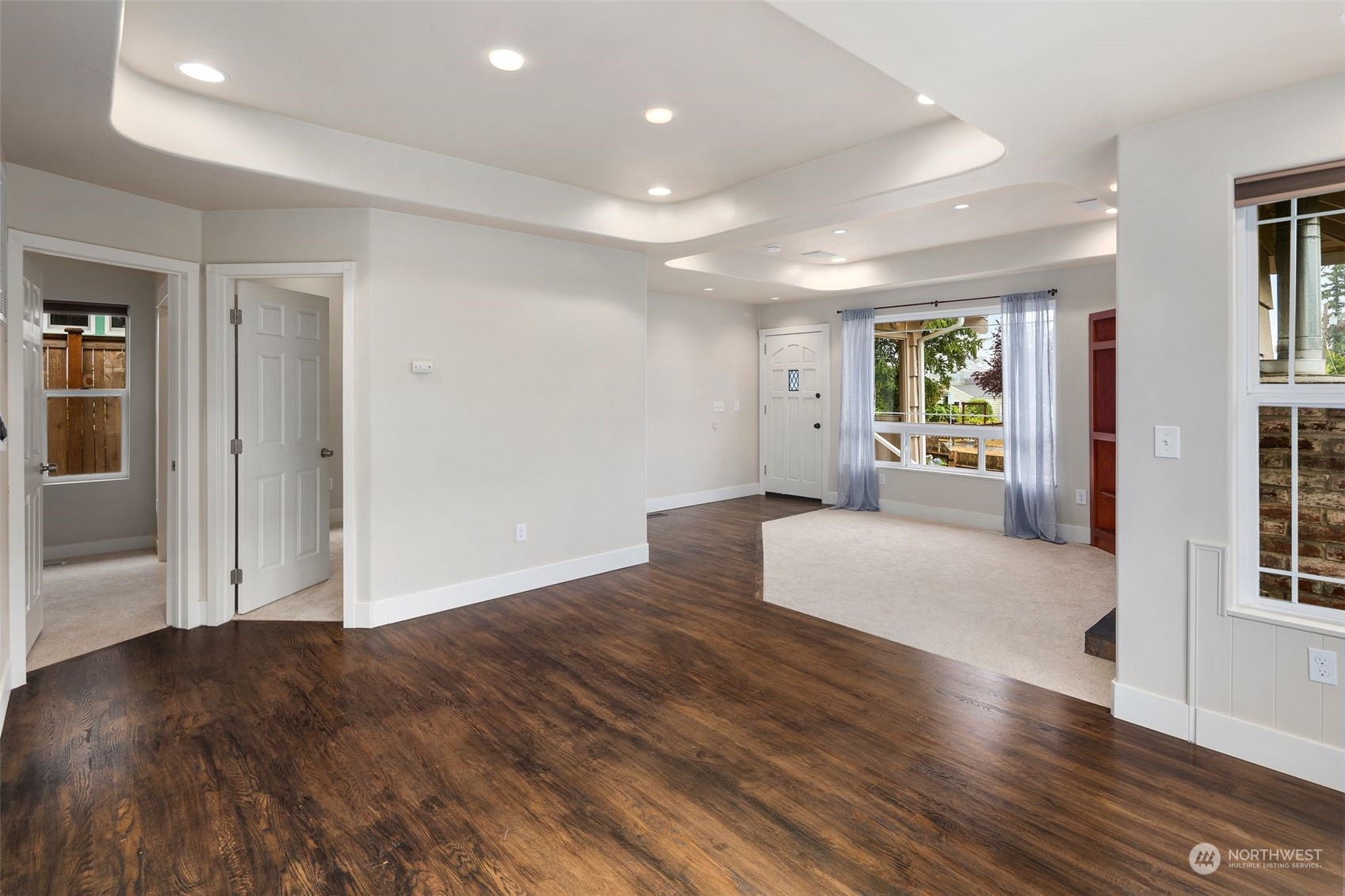 1524 Rockefeller Avenue Everett, WA 98201 - Photo 4 of 37 a view of an empty room with wooden floor and a window
