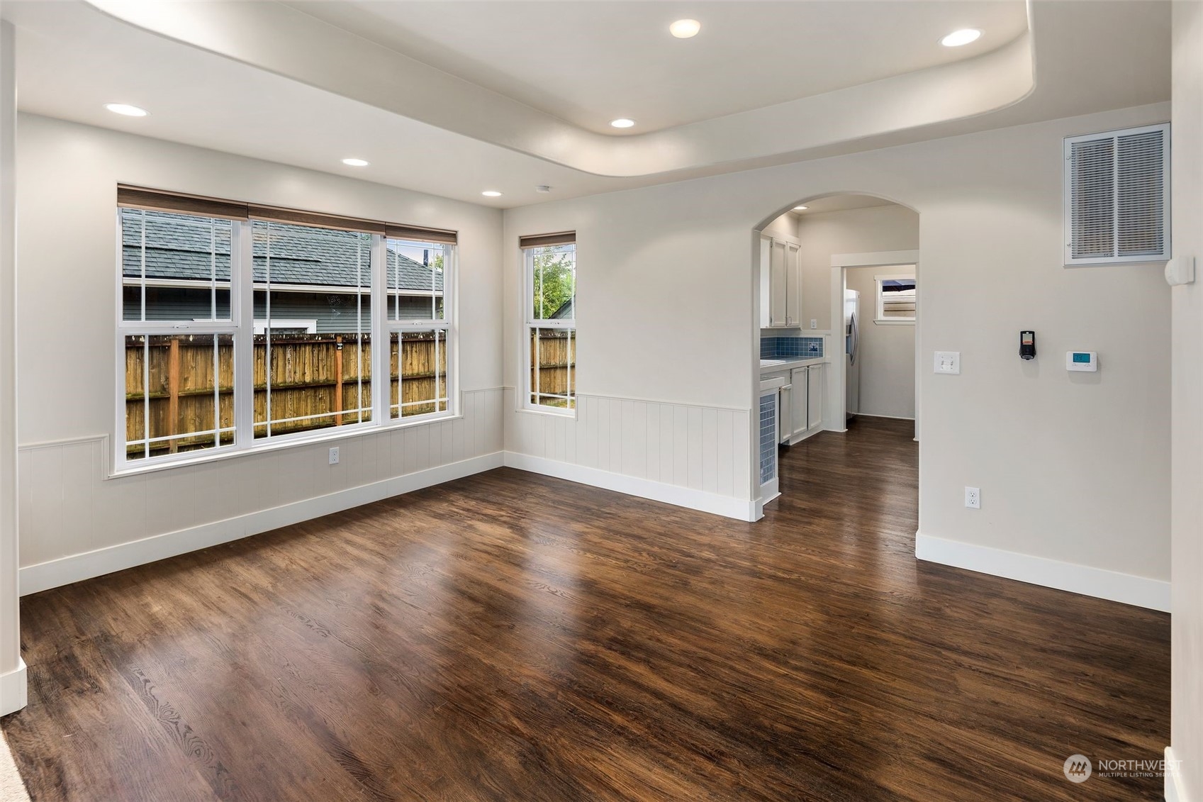 1524 Rockefeller Avenue Everett, WA 98201 - Photo 7 of 37 wooden floor in an empty room with a window