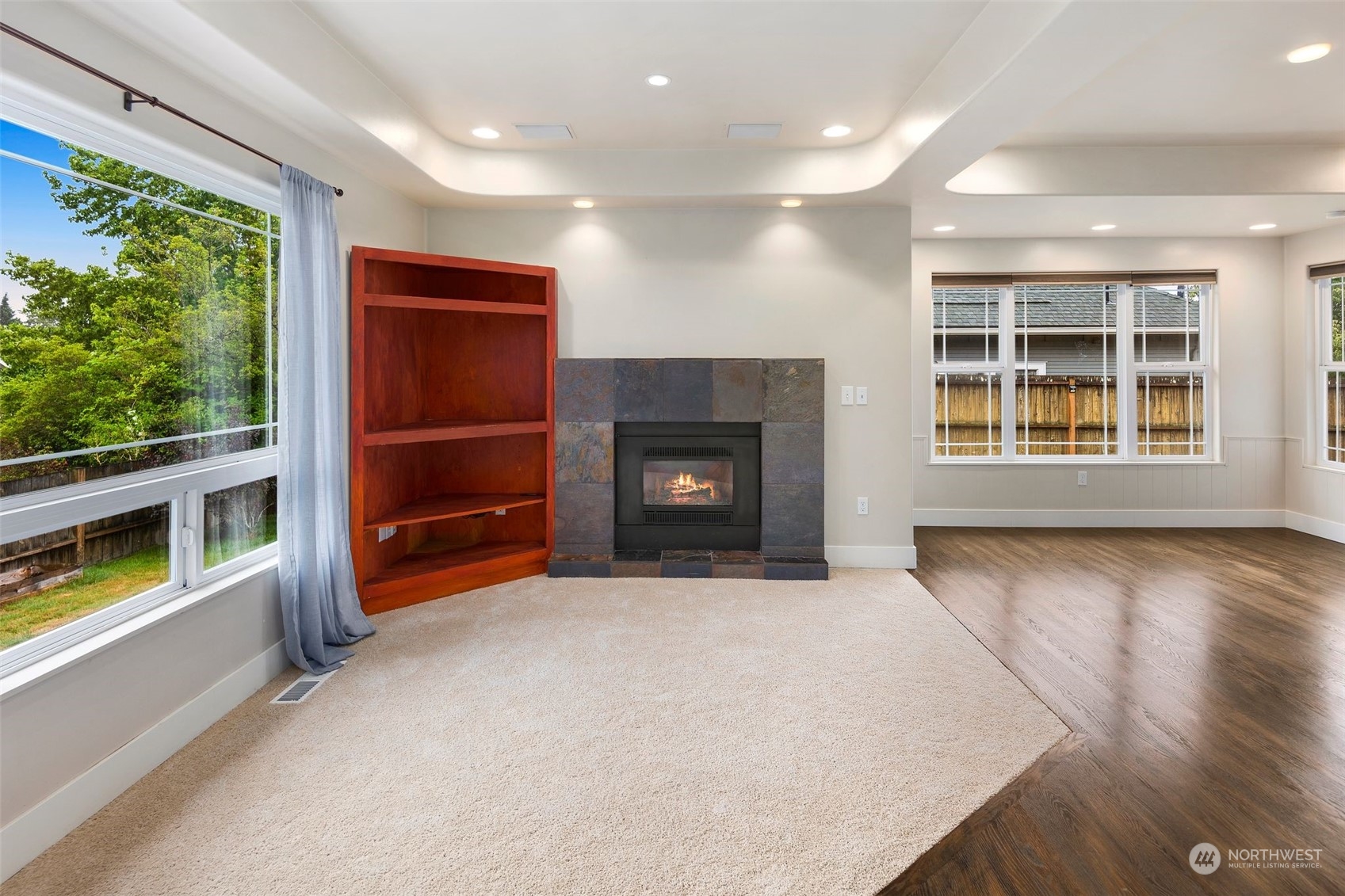 1524 Rockefeller Avenue Everett, WA 98201 - Photo 8 of 37 an empty room with windows and fireplace
