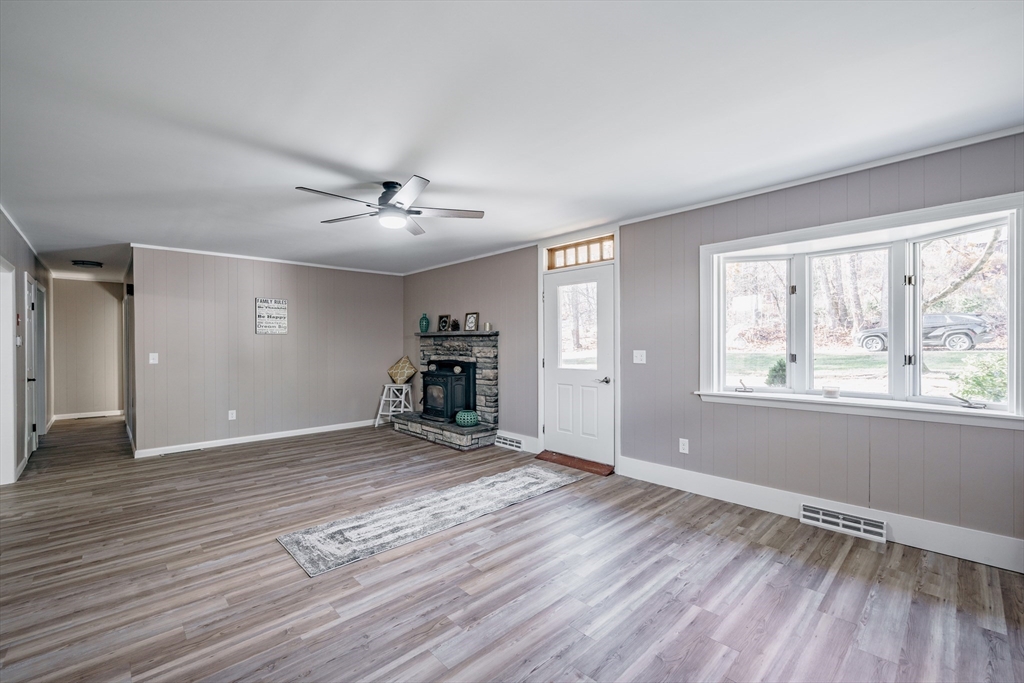 172 Bumstead Road Monson, MA 01057 - Photo 2 of 36 wooden floor in an empty room with a window