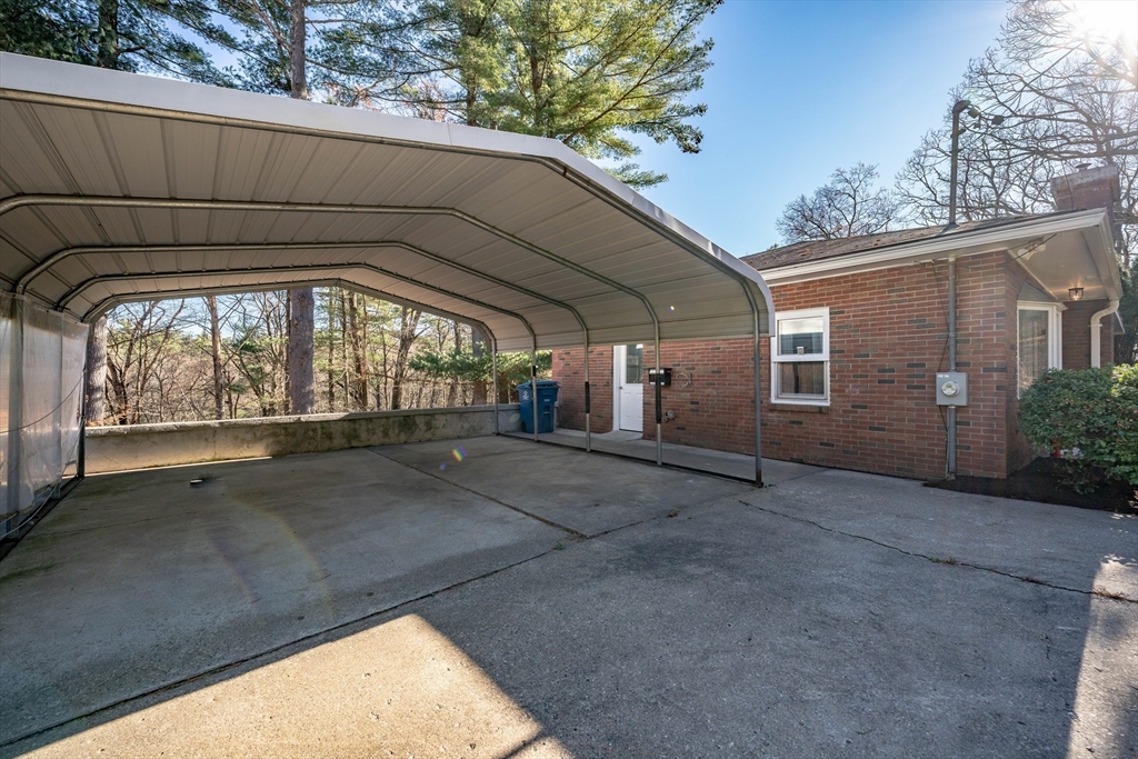 172 Bumstead Road Monson, MA 01057 - Photo 27 of 36 a view of a house with a garage