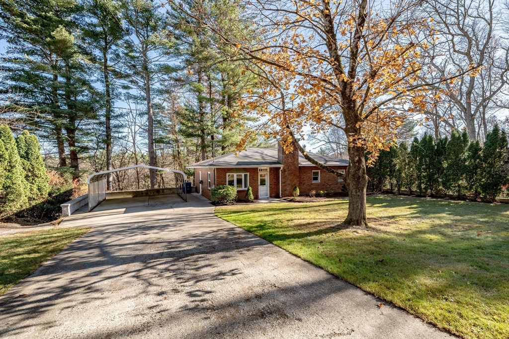 172 Bumstead Road Monson, MA 01057 - Photo 29 of 36 a view of a house with a yard and large trees