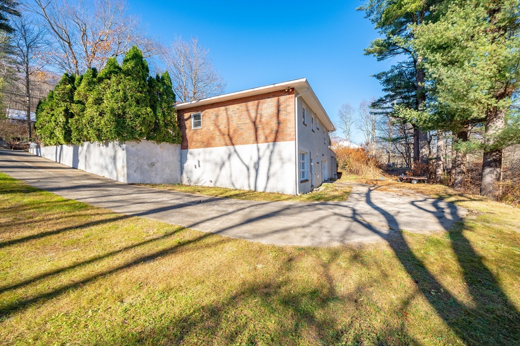 172 Bumstead Road Monson, MA 01057 - Photo 33 of 36 a view of a house with a swimming pool