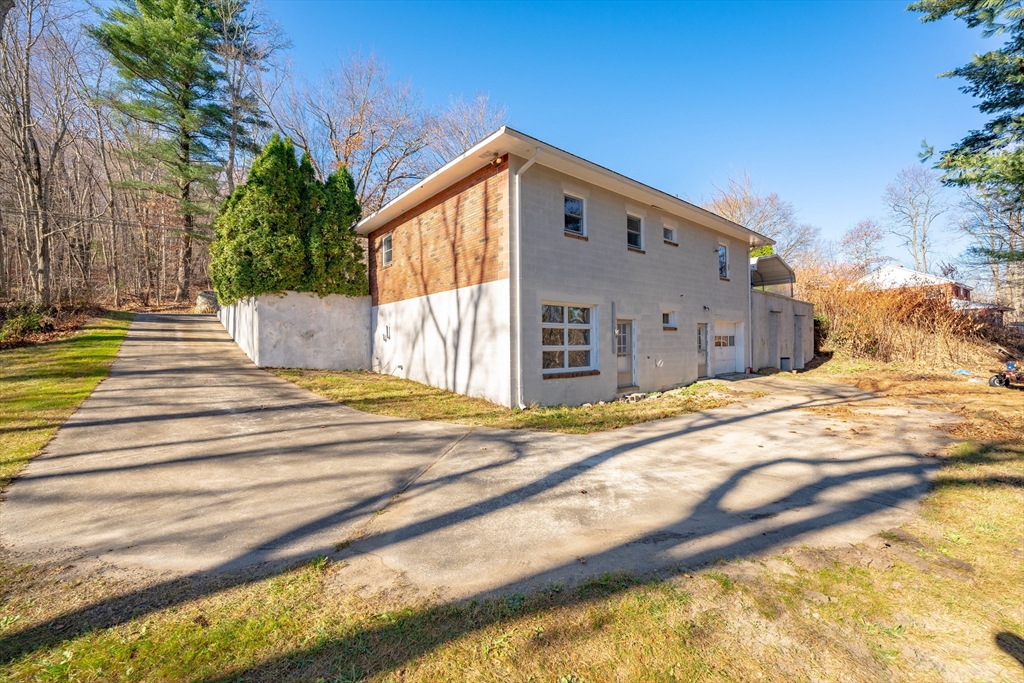172 Bumstead Road Monson, MA 01057 - Photo 34 of 36 a view of a house with a swimming pool