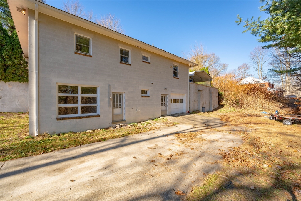 172 Bumstead Road Monson, MA 01057 - Photo 35 of 36 a front view of a house with a yard