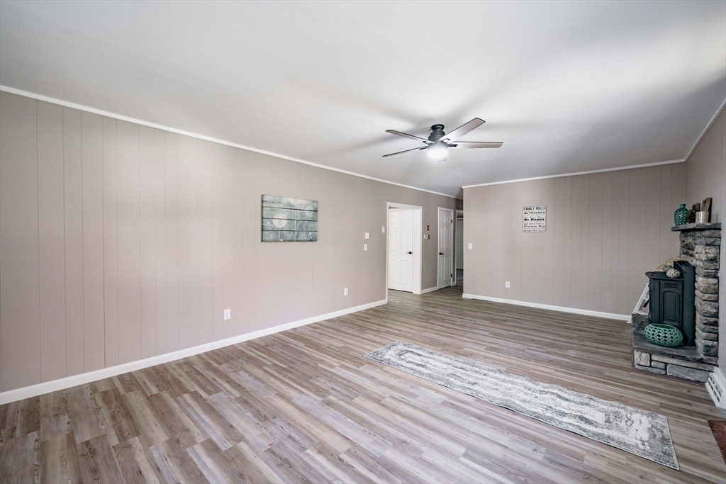 172 Bumstead Road Monson, MA 01057 - Photo 6 of 36 wooden floor in an empty room with a window