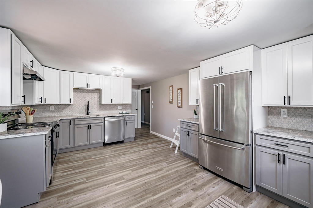 172 Bumstead Road Monson, MA 01057 - Photo 10 of 36 a kitchen with stainless steel appliances a refrigerator sink and cabinets