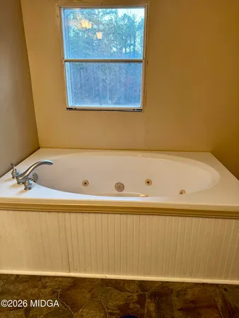 a bathroom with a bathtub