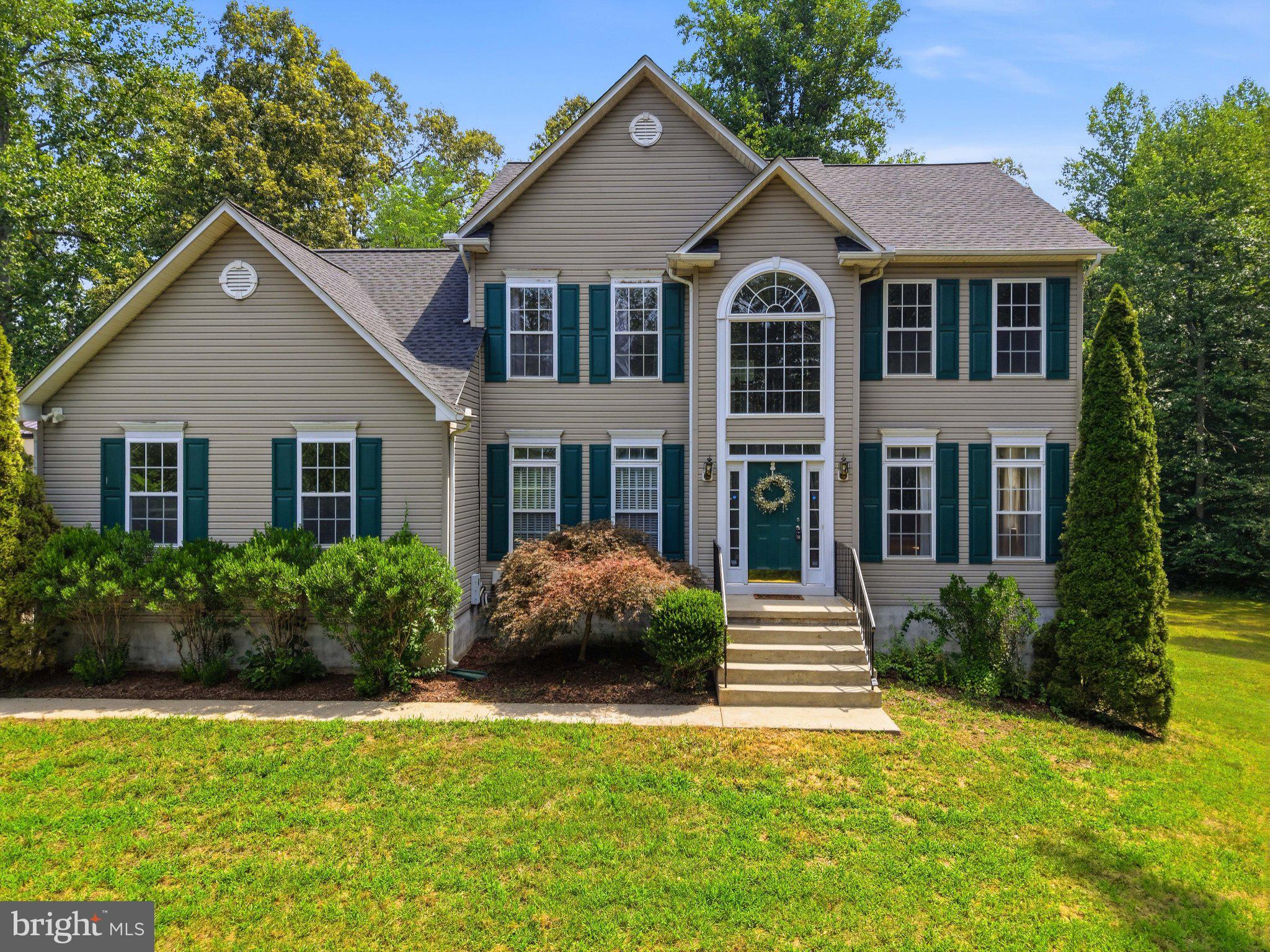4695 Sands Road Harwood, MD 20776 - Photo 1 of 53 Charming home with lush greenery.