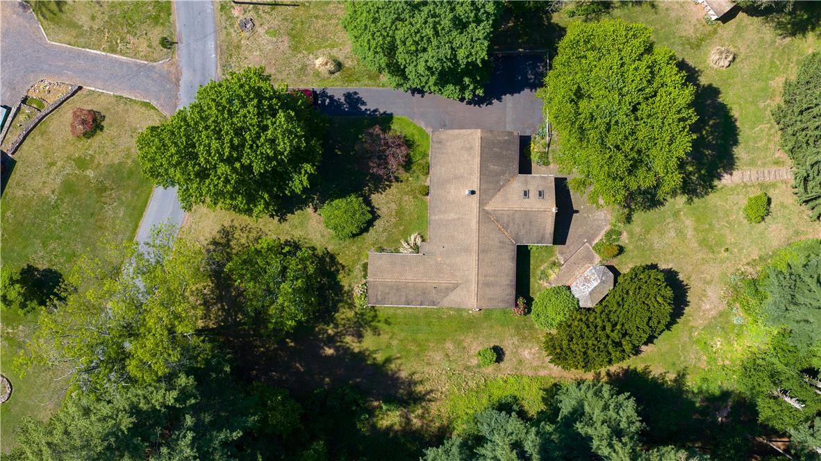 Coldsprings Rd Union Pottstown, PA 19465 - Photo 14 of 71 An aerial perspective reveals a private, tree-lined property with ample green space and a sprawling residence.