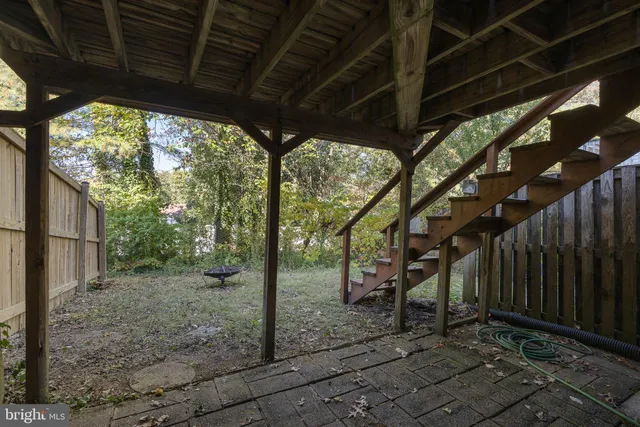 a view of a porch with furniture