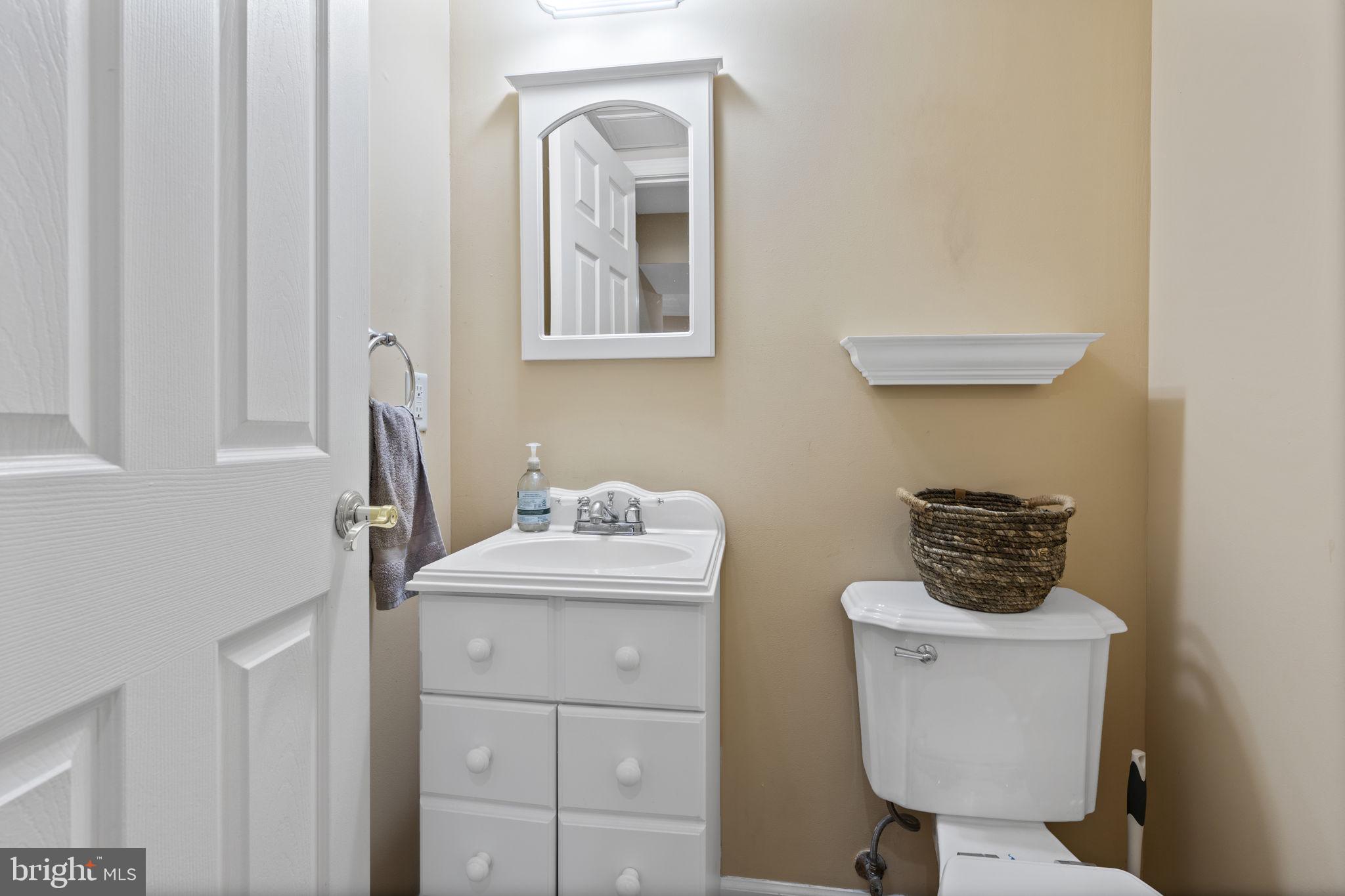 38 Trailwood Road Nottingham, MD 21236 - Photo 22 of 36 a bathroom with a toilet sink and mirror