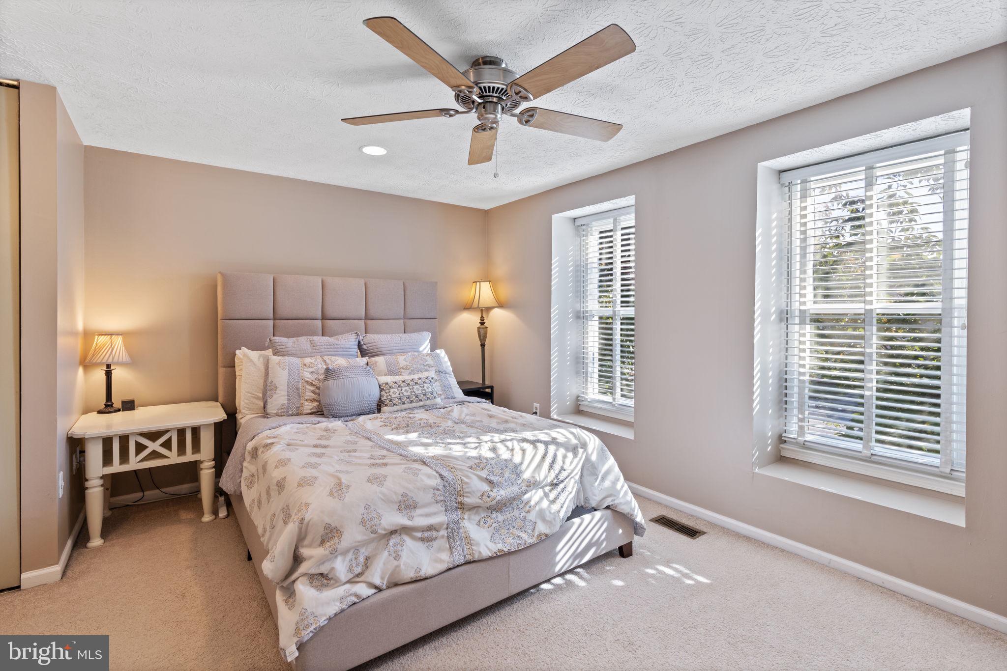 38 Trailwood Road Nottingham, MD 21236 - Photo 28 of 36 a bedroom with a bed and window