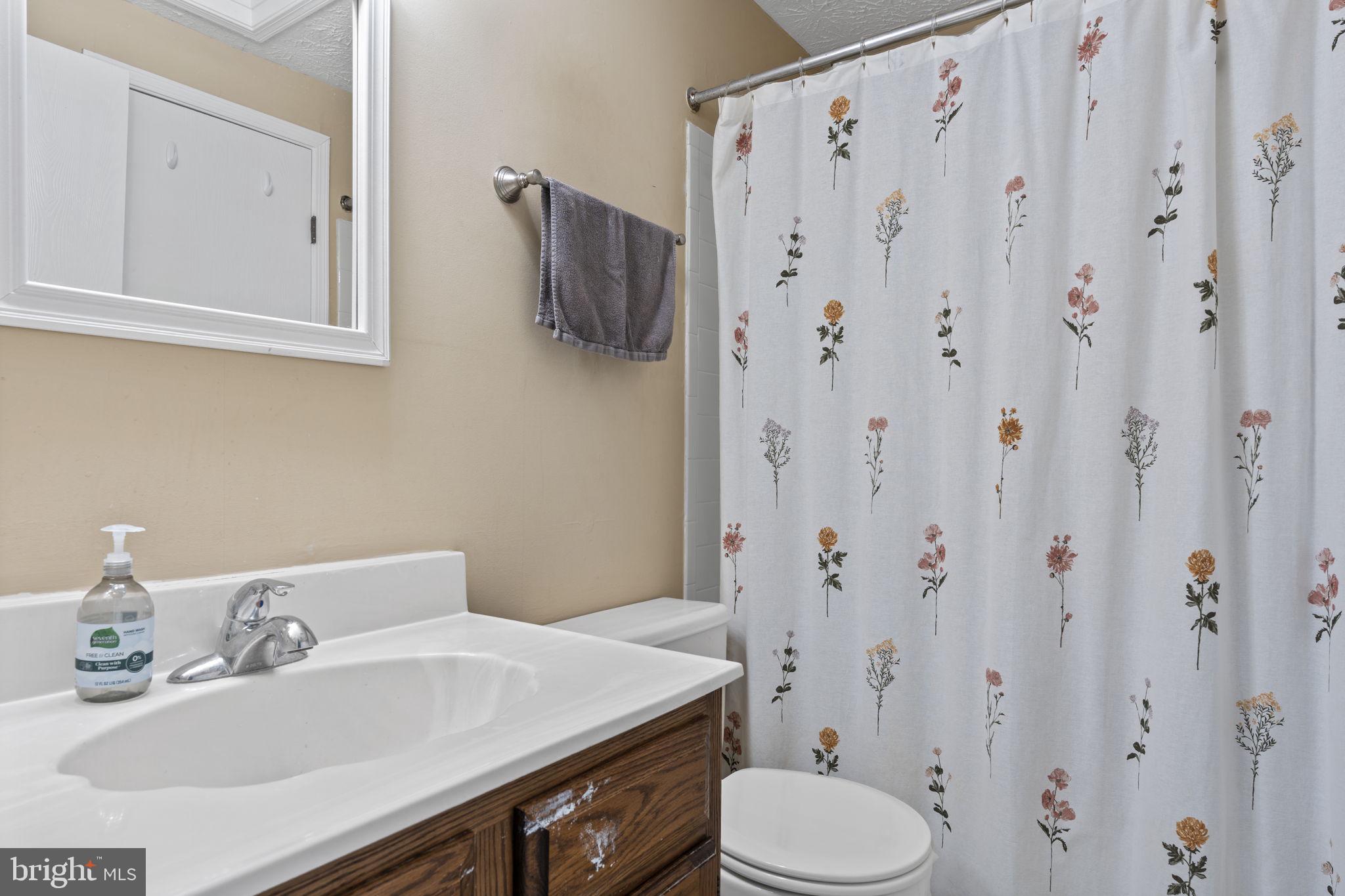 38 Trailwood Road Nottingham, MD 21236 - Photo 34 of 36 a bathroom with a sink toilet and shower
