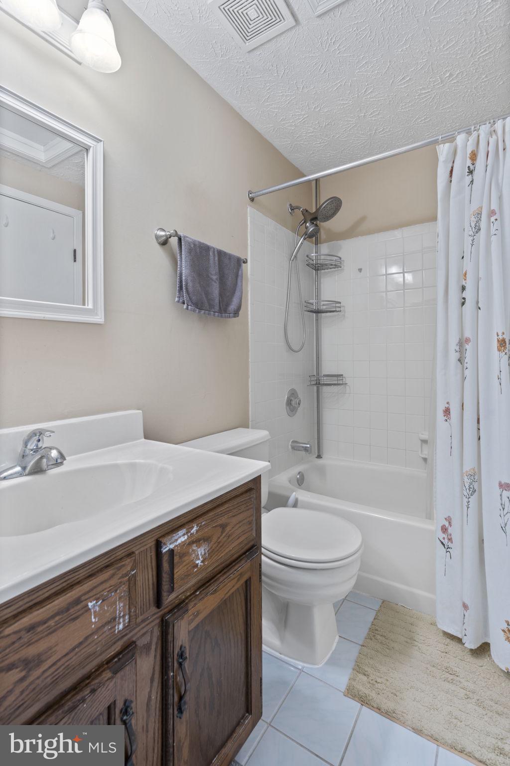 38 Trailwood Road Nottingham, MD 21236 - Photo 36 of 36 a bathroom with a granite countertop sink toilet and shower