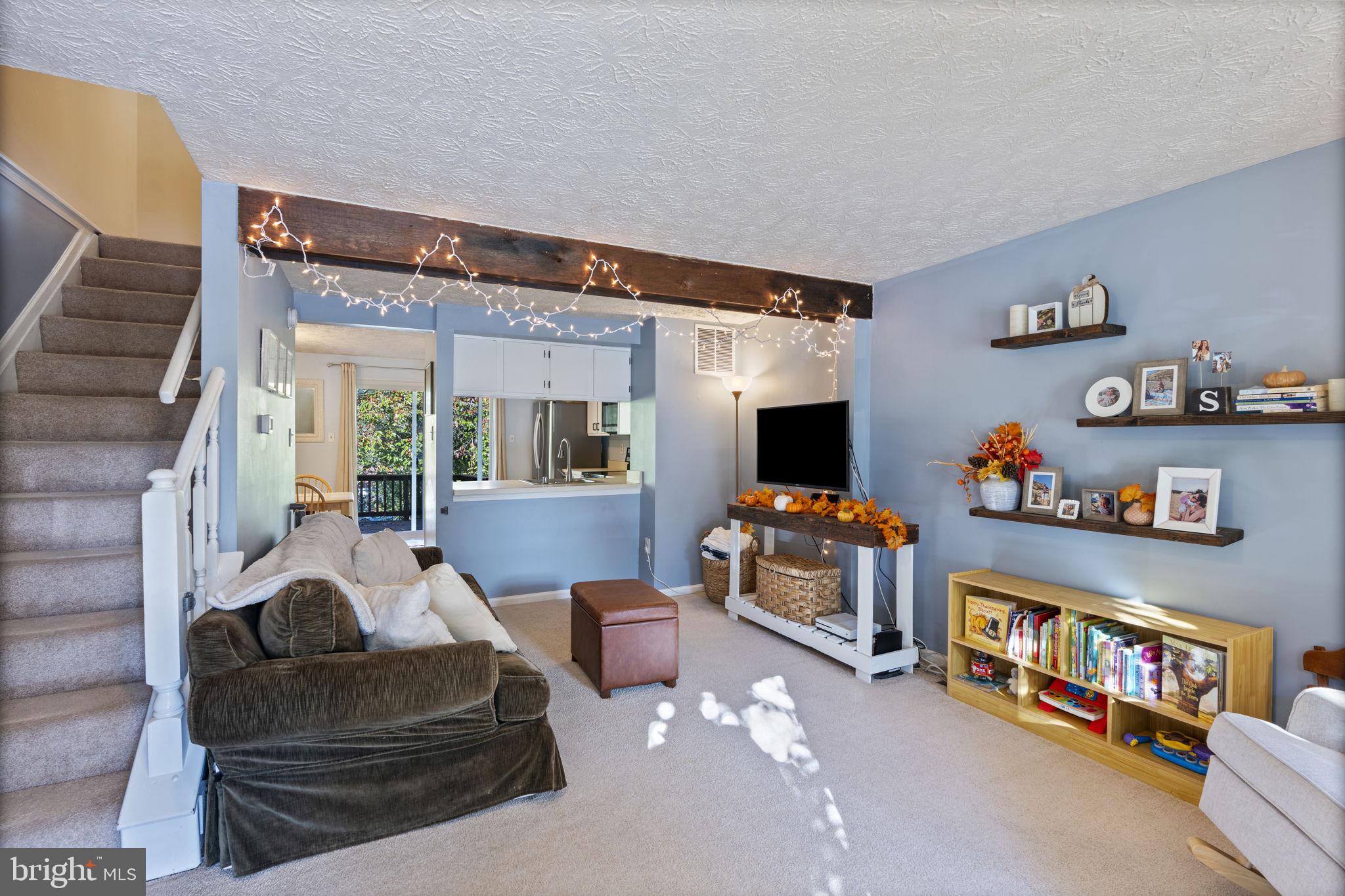 38 Trailwood Road Nottingham, MD 21236 - Photo 9 of 36 a living room with furniture and a flat screen tv