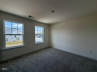 706 Old Station Angier, NC 27501 - Photo 12 of 19 an empty room with windows
