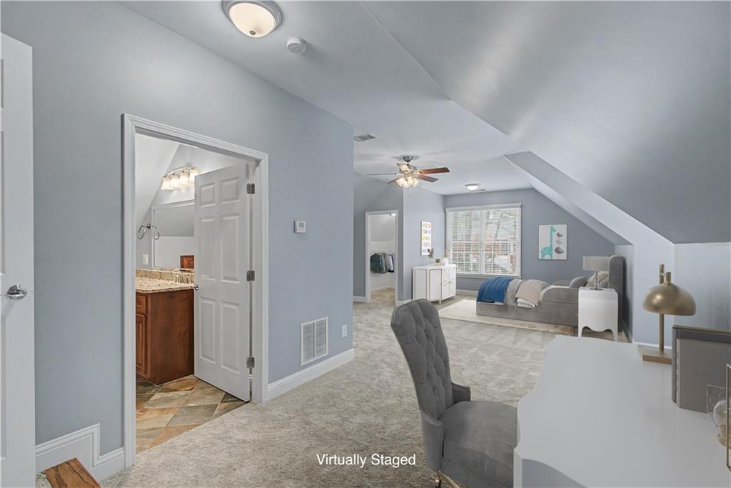 3045 Camp Branch Road Buford, GA 30519 - Photo 39 of 78 a view of a livingroom with furniture and windows