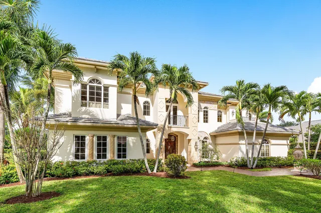 a view of a livingroom with furniture wooden floor and window