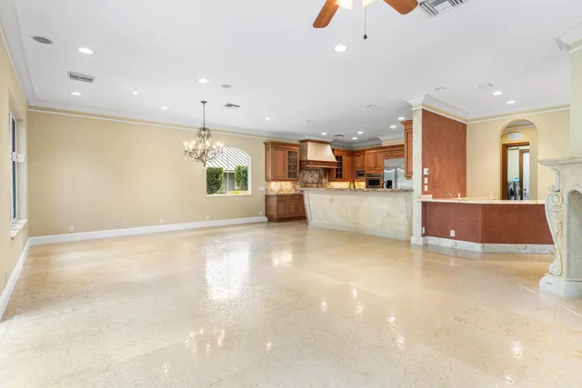 a view of a living room and balcony