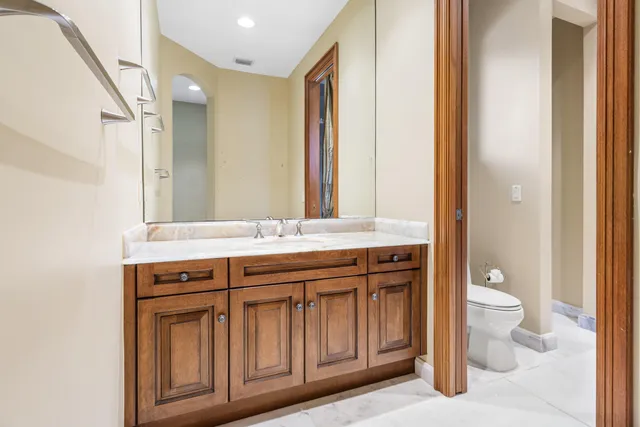 an aerial view of a house with yard swimming pool and outdoor seating