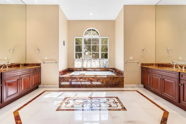 a view of a hallway with a chandelier