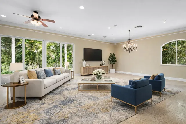 a spacious bedroom with a bed and a couch