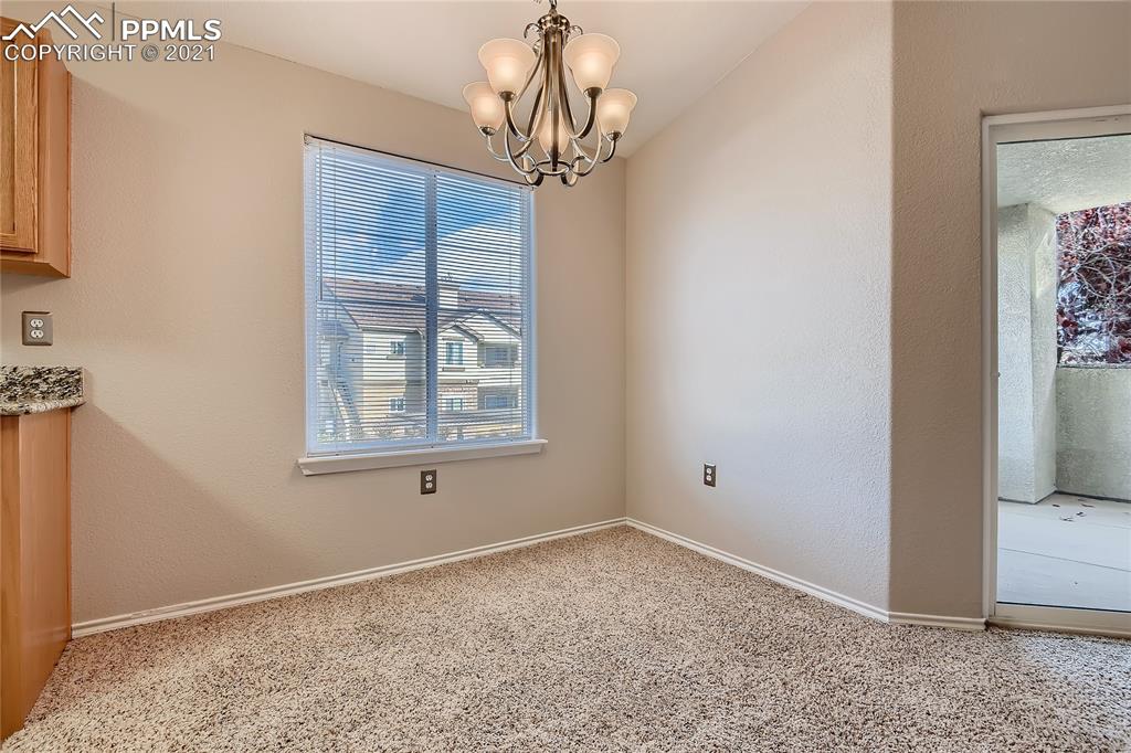 3780 Riviera Grove, Unit 204 Colorado Springs, CO 80922 - Photo 11 of 33 a view of empty room with window