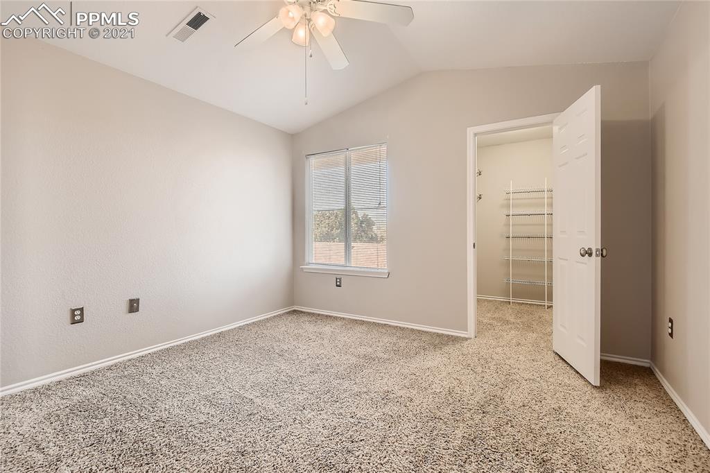 3780 Riviera Grove, Unit 204 Colorado Springs, CO 80922 - Photo 18 of 33 a view of an empty room with a window