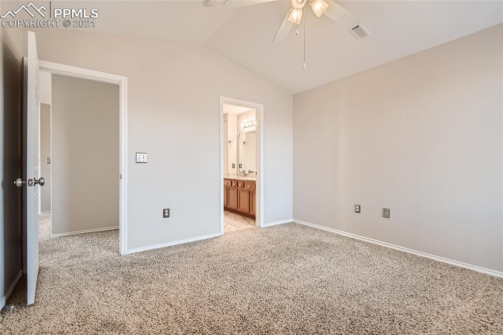 3780 Riviera Grove, Unit 204 Colorado Springs, CO 80922 - Photo 20 of 33 a view of an empty room with a window