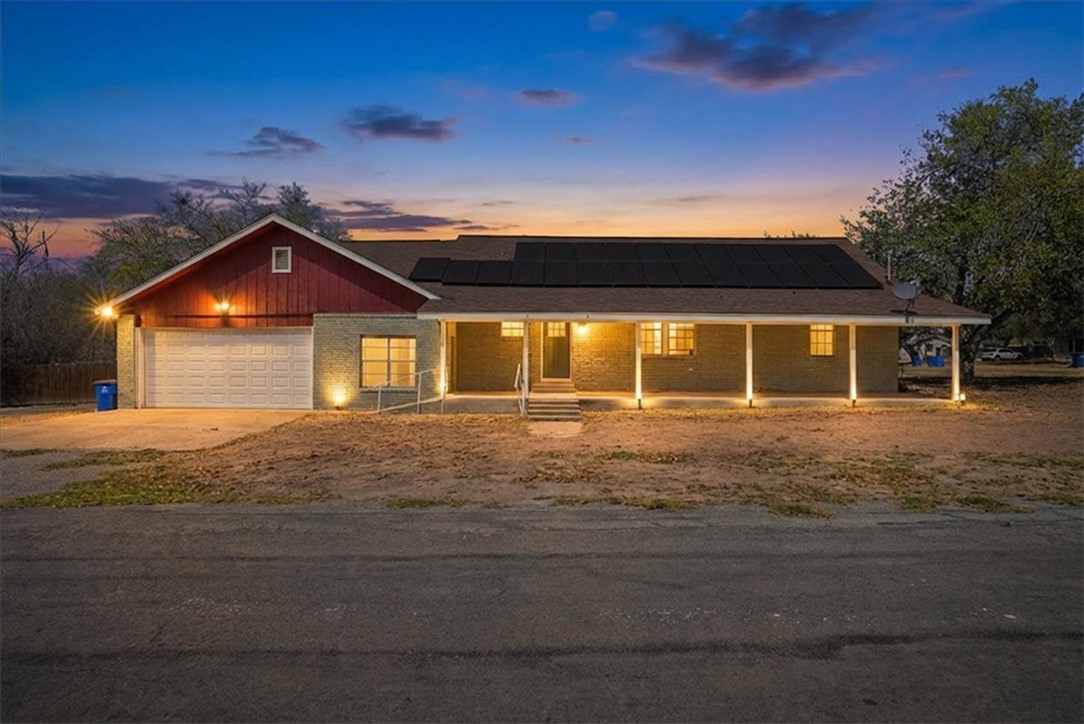 1601 Owens Avenue Three Rivers, TX 78071 - Photo 2 of 34 a front view of a house with a yard