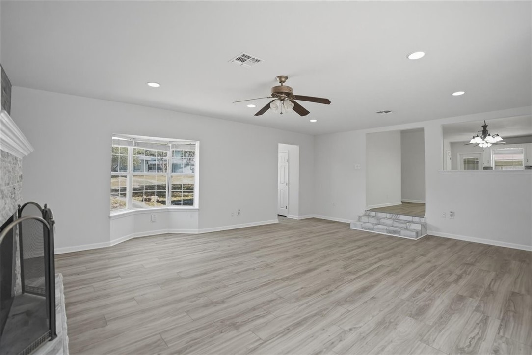 1601 Owens Avenue Three Rivers, TX 78071 - Photo 7 of 34 a view of empty room with wooden floor and window