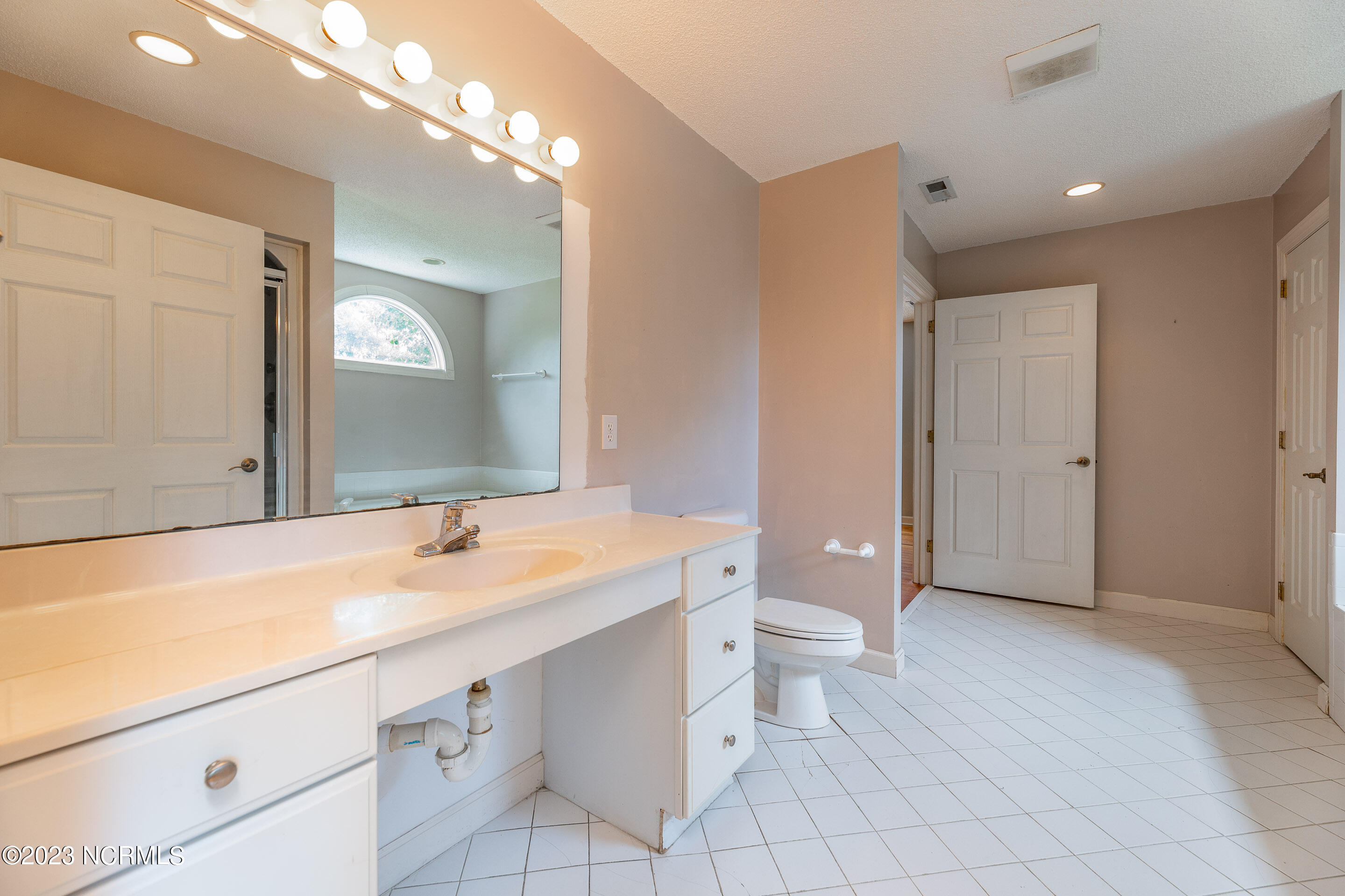 704 Cordgrass Road Hampstead, NC 28443 - Photo 23 of 39 Primary Bath