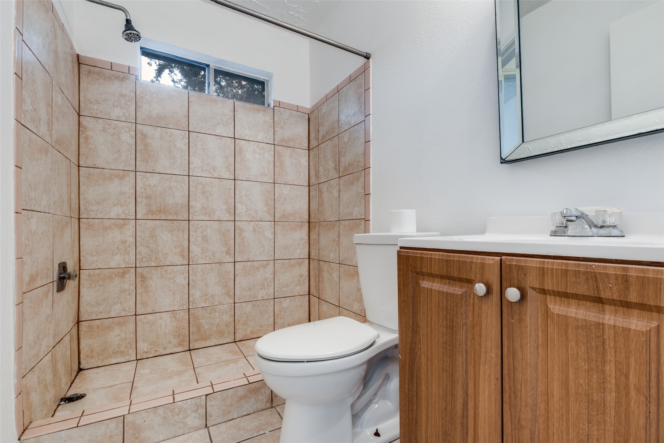 2014 Powder Mist Lane Katy, TX 77449 - Photo 8 of 12 Shared bathroom is between the two secondary bedrooms.