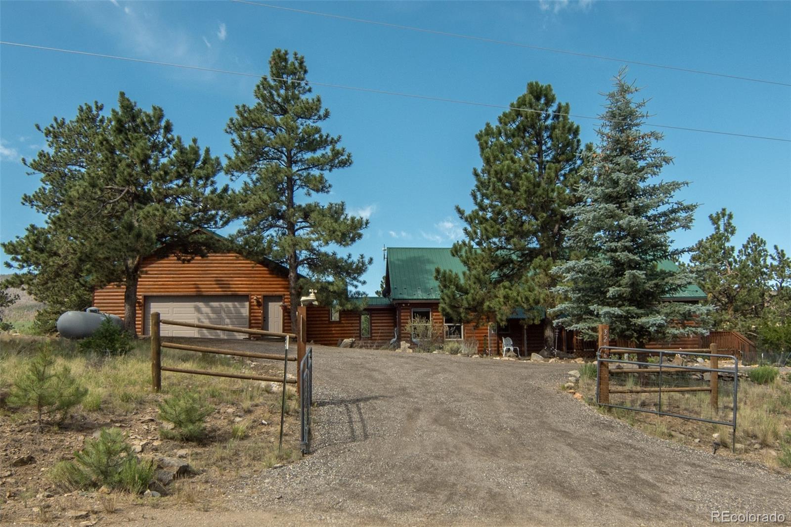 3296 Singletree Road Hartsel, CO 80449 - Photo 13 of 50 a backyard of a house with lots of green space