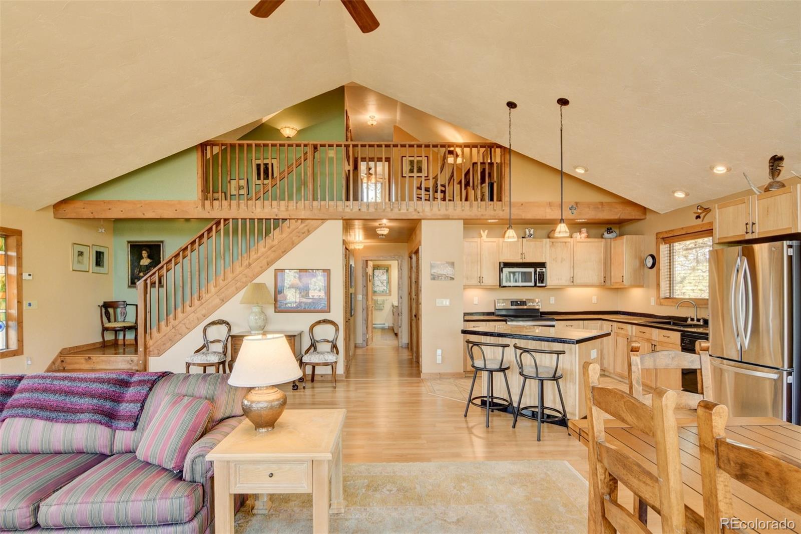 3296 Singletree Road Hartsel, CO 80449 - Photo 18 of 50 a roof deck with table and chairs