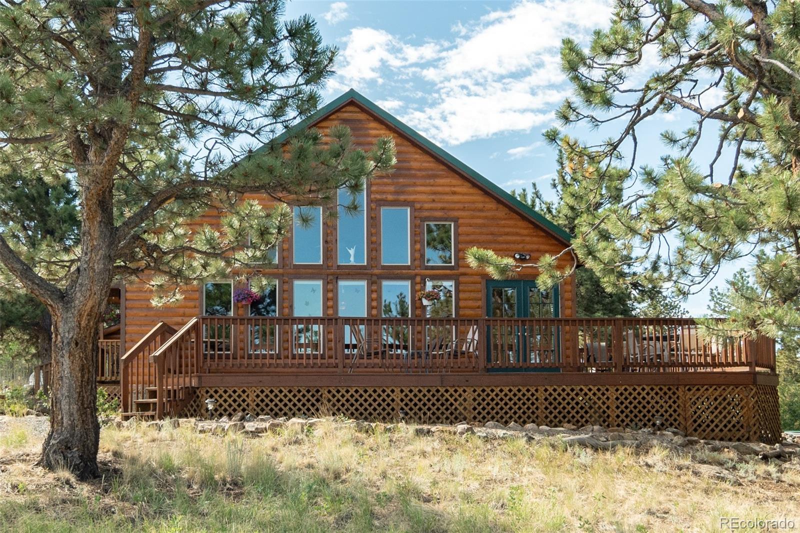 3296 Singletree Road Hartsel, CO 80449 - Photo 3 of 50 a front view of a house