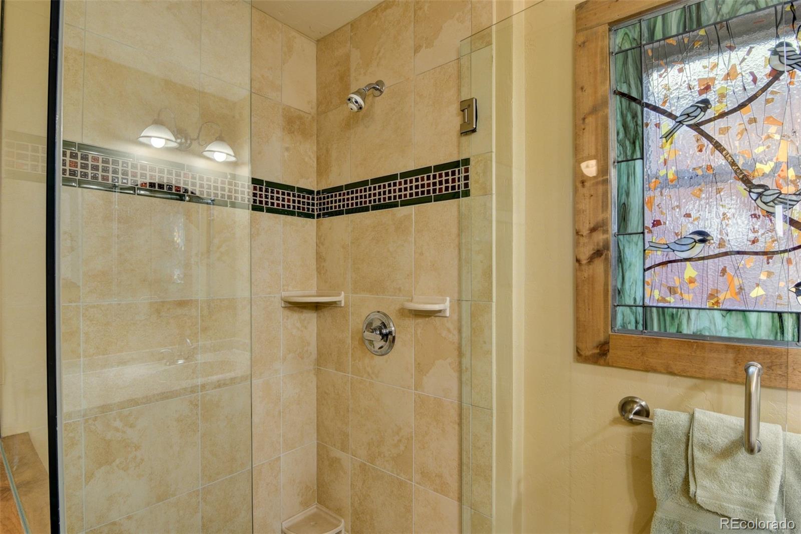 3296 Singletree Road Hartsel, CO 80449 - Photo 34 of 50 a bathroom with a shower